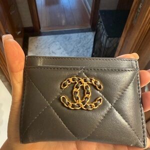 CHANEL Quilted grey Card Holder with Gold Logo